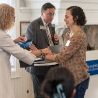 faculty by the podium